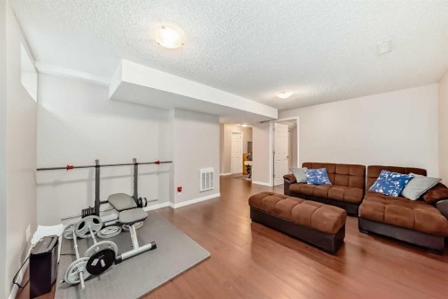 327 Hidden Ranch Circle Nw, Calgary, AB - Indoor Photo Showing Living Room