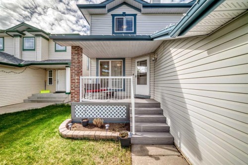 327 Hidden Ranch Circle Nw, Calgary, AB - Outdoor With Deck Patio Veranda