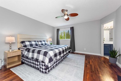 44 Tuscarora Place Nw, Calgary, AB - Indoor Photo Showing Bedroom