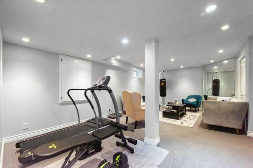 44 Tuscarora Place Nw, Calgary, AB - Indoor Photo Showing Gym Room