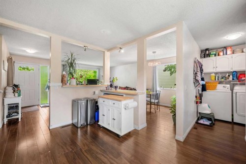 224 Ranchview Place Nw, Calgary, AB - Indoor Photo Showing Laundry Room