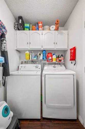 224 Ranchview Place Nw, Calgary, AB - Indoor Photo Showing Laundry Room
