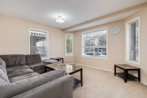 31 Taralake Gardens Ne, Calgary, AB - Indoor Photo Showing Living Room