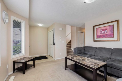 31 Taralake Gardens Ne, Calgary, AB - Indoor Photo Showing Living Room