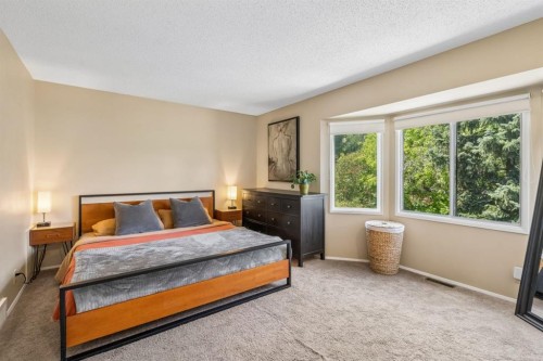 47 Cedargrove Way Sw, Calgary, AB - Indoor Photo Showing Bedroom
