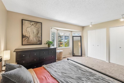47 Cedargrove Way Sw, Calgary, AB - Indoor Photo Showing Bedroom
