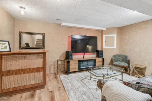 47 Cedargrove Way Sw, Calgary, AB - Indoor Photo Showing Living Room