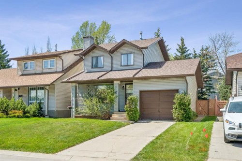47 Cedargrove Way Sw, Calgary, AB - Outdoor With Facade