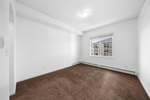 2320-215 Legacy Boulevard Se, Calgary, AB - Indoor Photo Showing Other Room