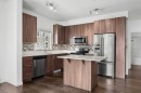 2320-215 Legacy Boulevard Se, Calgary, AB  - Indoor Photo Showing Kitchen With Stainless Steel Kitchen With Upgraded Kitchen 