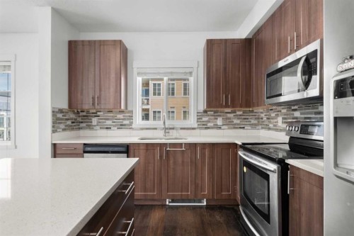 2320-215 Legacy Boulevard Se, Calgary, AB - Indoor Photo Showing Kitchen With Stainless Steel Kitchen With Upgraded Kitchen