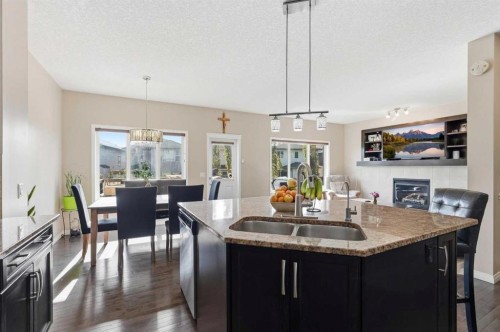 19 Hillcrest Link Sw, Airdrie, AB - Indoor Photo Showing Kitchen With Double Sink