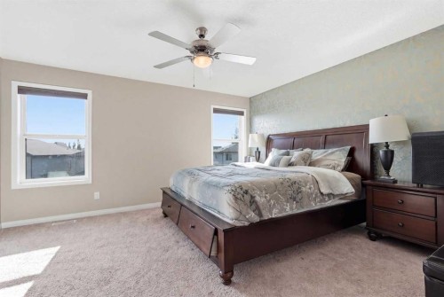 19 Hillcrest Link Sw, Airdrie, AB - Indoor Photo Showing Bedroom