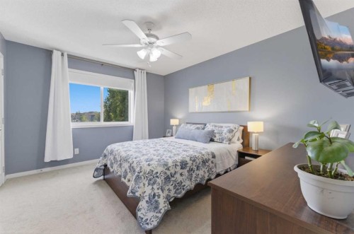 394 Copperpond Boulevard Se, Calgary, AB - Indoor Photo Showing Bedroom