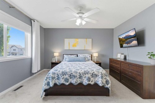 394 Copperpond Boulevard Se, Calgary, AB - Indoor Photo Showing Bedroom