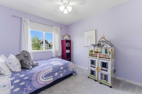 394 Copperpond Boulevard Se, Calgary, AB - Indoor Photo Showing Bedroom
