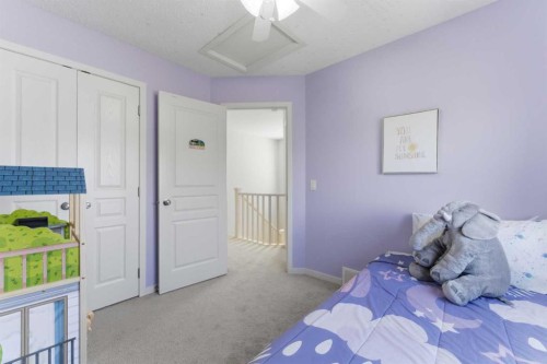 394 Copperpond Boulevard Se, Calgary, AB - Indoor Photo Showing Bedroom