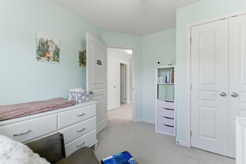 394 Copperpond Boulevard Se, Calgary, AB - Indoor Photo Showing Bedroom