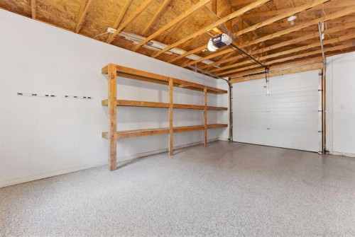 394 Copperpond Boulevard Se, Calgary, AB - Indoor Photo Showing Garage