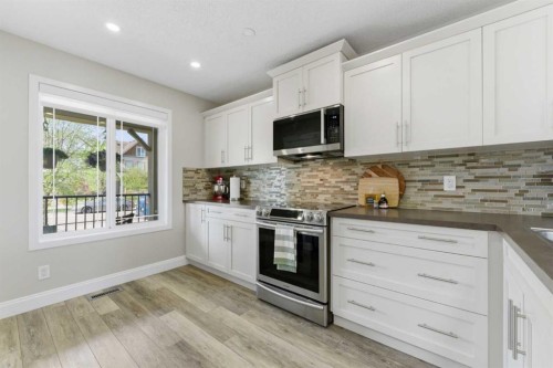 394 Copperpond Boulevard Se, Calgary, AB - Indoor Photo Showing Kitchen With Upgraded Kitchen