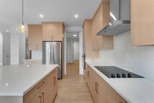 416 Watercrest Place, Chestermere, AB - Indoor Photo Showing Kitchen With Upgraded Kitchen