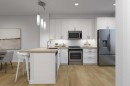 603-437 Alpine Avenue Sw, Calgary, AB  - Indoor Photo Showing Kitchen With Upgraded Kitchen 