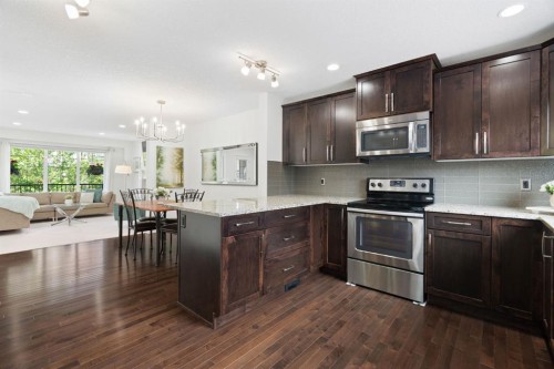 54 Legacy Common Se, Calgary, AB - Indoor Photo Showing Kitchen With Upgraded Kitchen