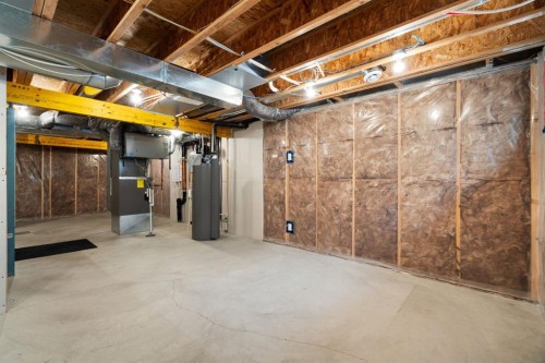 54 Legacy Common Se, Calgary, AB - Indoor Photo Showing Basement