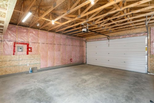 54 Legacy Common Se, Calgary, AB - Indoor Photo Showing Garage