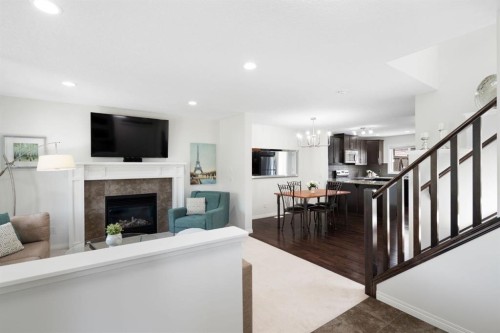 54 Legacy Common Se, Calgary, AB - Indoor Photo Showing Other Room With Fireplace