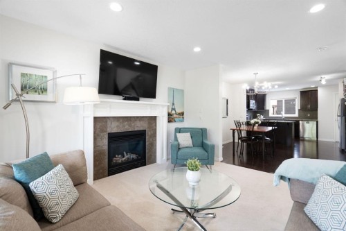 54 Legacy Common Se, Calgary, AB - Indoor Photo Showing Living Room With Fireplace