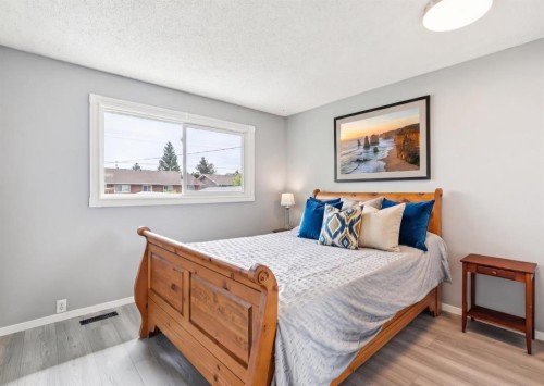 7828 20A Street Se, Calgary, AB - Indoor Photo Showing Bedroom