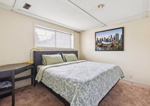 7828 20A Street Se, Calgary, AB - Indoor Photo Showing Bedroom