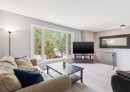 7828 20A Street Se, Calgary, AB  - Indoor Photo Showing Living Room 