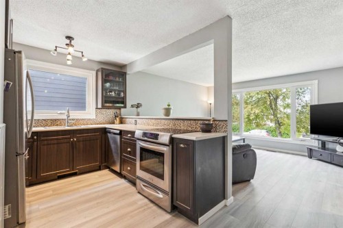 7828 20A Street Se, Calgary, AB - Indoor Photo Showing Kitchen