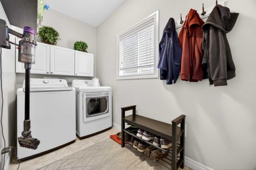 293 Bridleridge View Sw, Calgary, AB - Indoor Photo Showing Laundry Room