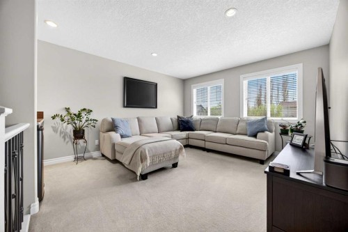 293 Bridleridge View Sw, Calgary, AB - Indoor Photo Showing Living Room