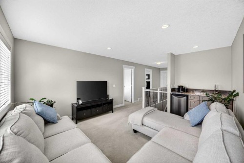 293 Bridleridge View Sw, Calgary, AB - Indoor Photo Showing Living Room
