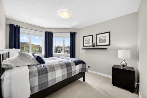 293 Bridleridge View Sw, Calgary, AB - Indoor Photo Showing Bedroom