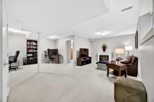 293 Bridleridge View Sw, Calgary, AB - Indoor With Fireplace