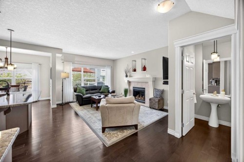 293 Bridleridge View Sw, Calgary, AB - Indoor Photo Showing Living Room With Fireplace