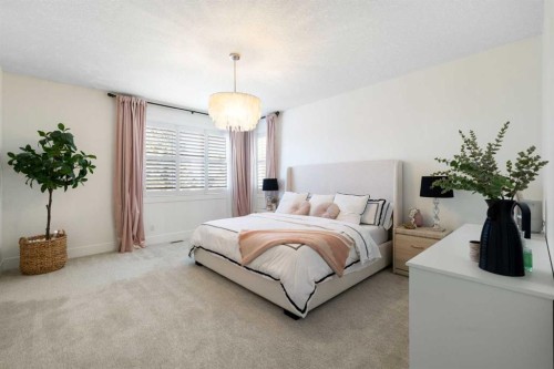 13 Shawnee Heath Sw, Calgary, AB - Indoor Photo Showing Bedroom