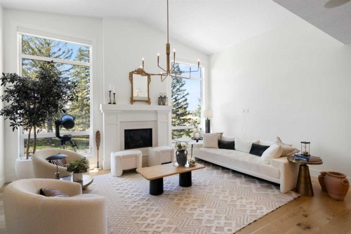 13 Shawnee Heath Sw, Calgary, AB - Indoor Photo Showing Living Room With Fireplace