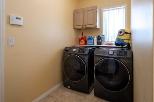 49 Scandia Hill Nw, Calgary, AB - Indoor Photo Showing Laundry Room