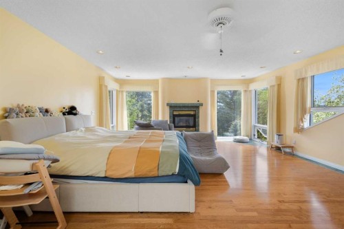 49 Scandia Hill Nw, Calgary, AB - Indoor Photo Showing Other Room With Fireplace