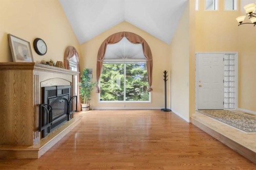 49 Scandia Hill Nw, Calgary, AB - Indoor With Fireplace