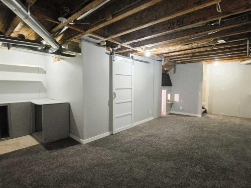 210 Prestwick Circle Se, Calgary, AB - Indoor Photo Showing Basement