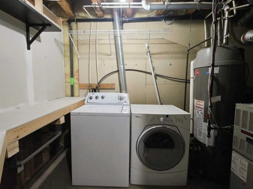 210 Prestwick Circle Se, Calgary, AB - Indoor Photo Showing Laundry Room