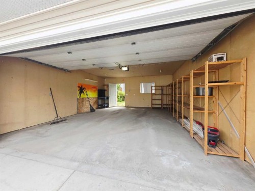 210 Prestwick Circle Se, Calgary, AB - Indoor Photo Showing Garage