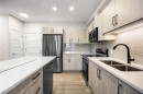 1107-81 Arbour Lake View Nw, Calgary, AB  - Indoor Photo Showing Kitchen With Stainless Steel Kitchen With Double Sink With Upgraded Kitchen 
